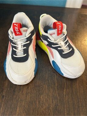 Puma Kids White Sneakers with Blue, Red and Neon Yellow Accents